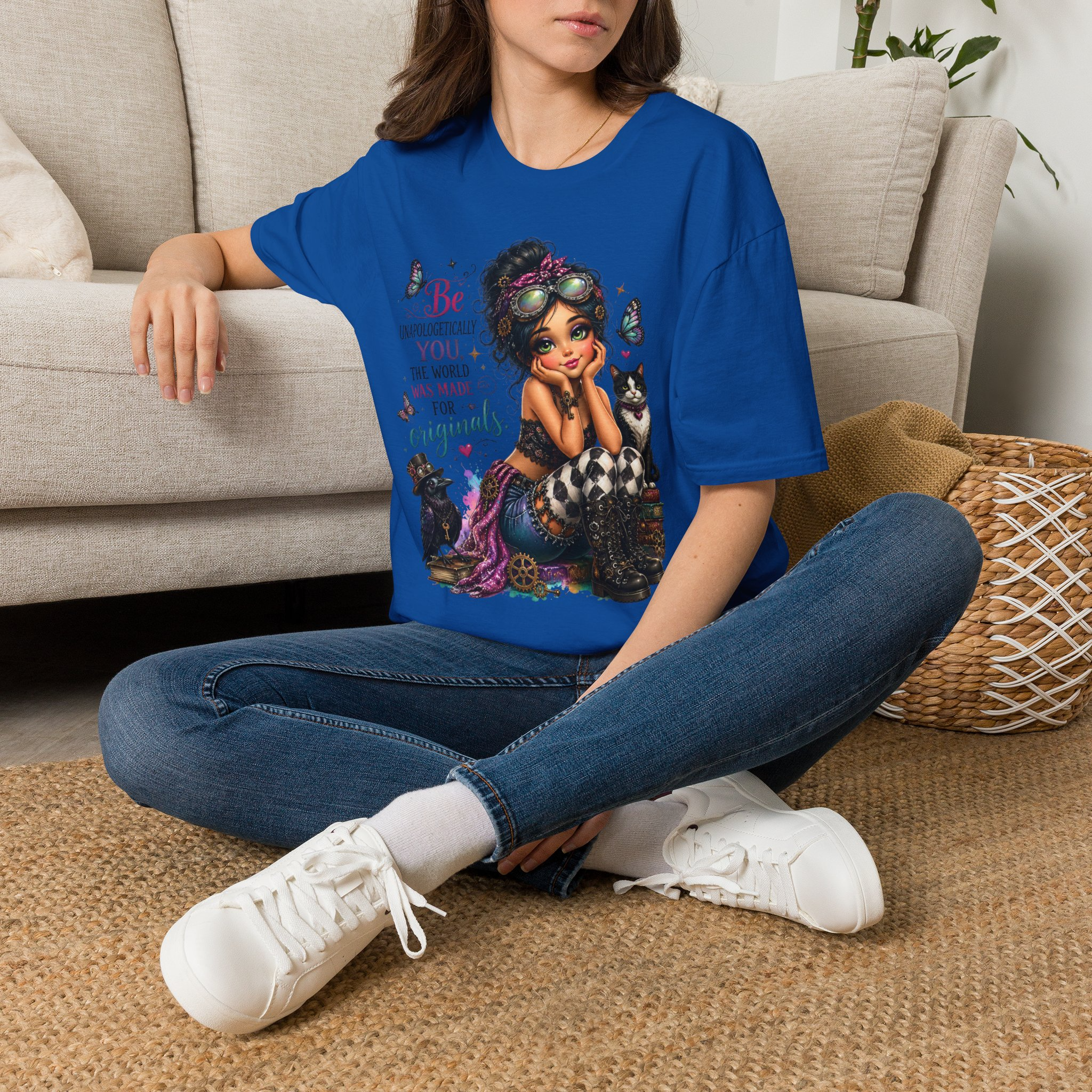 Woman wearing the Be Unapologetically You graphic T-shirt in royal blue