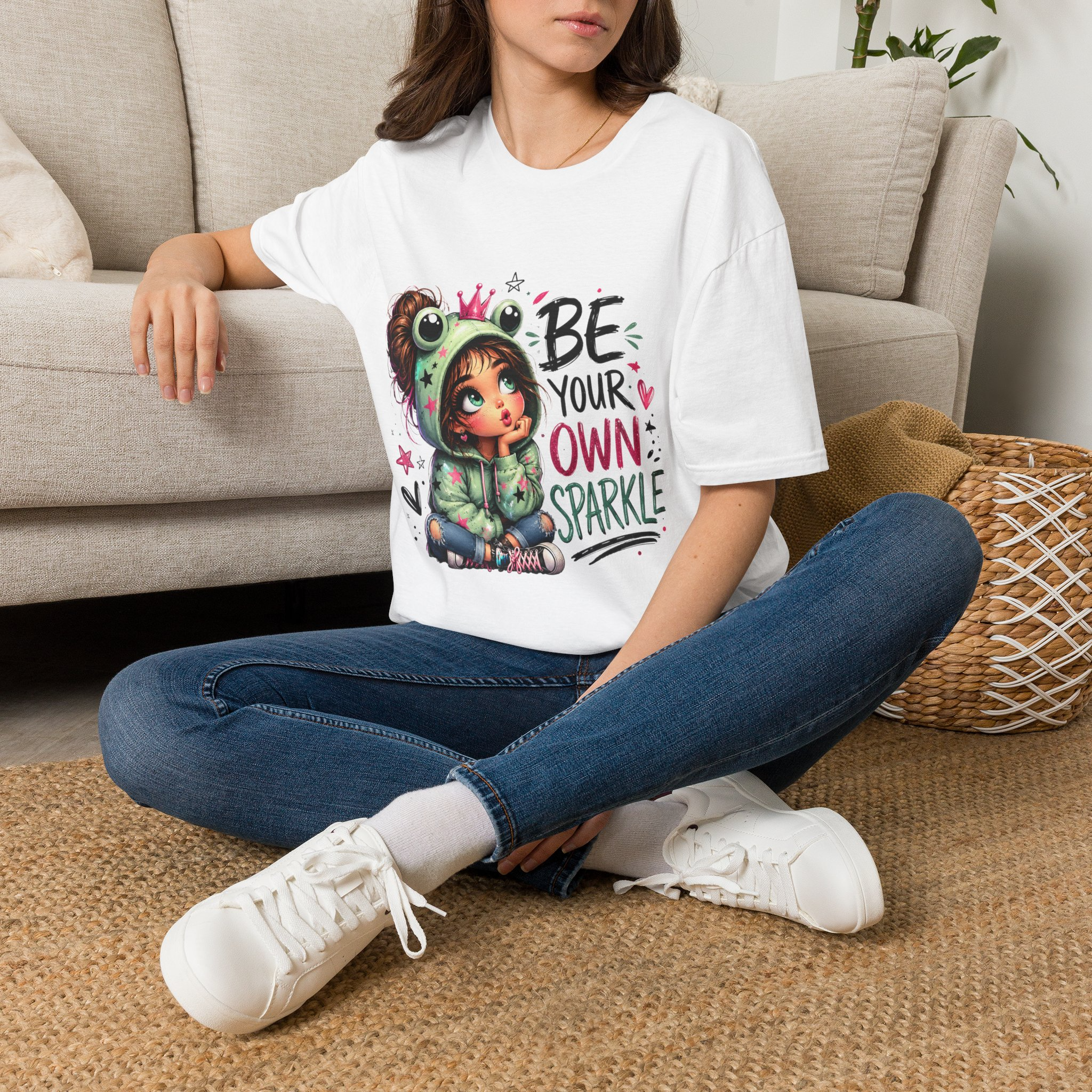 Woman wearing the Be Your Own Sparkle graphic T-shirt in white