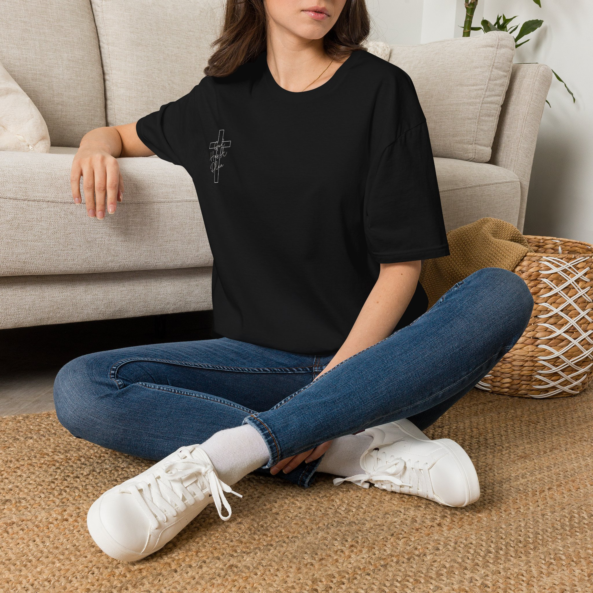 Woman wearing the black God Has a Plan Christian T-shirt front view